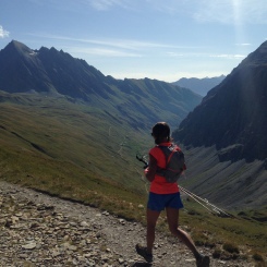 North Face athlete and second placed woman Rory Bosio heads off down the valley